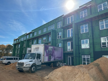 ABS truck outside a multifamily project