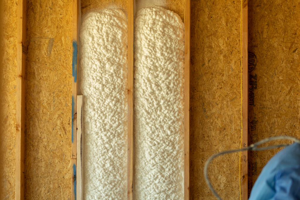 Spray foam insulation installed in a wall on a new build in Charlotte