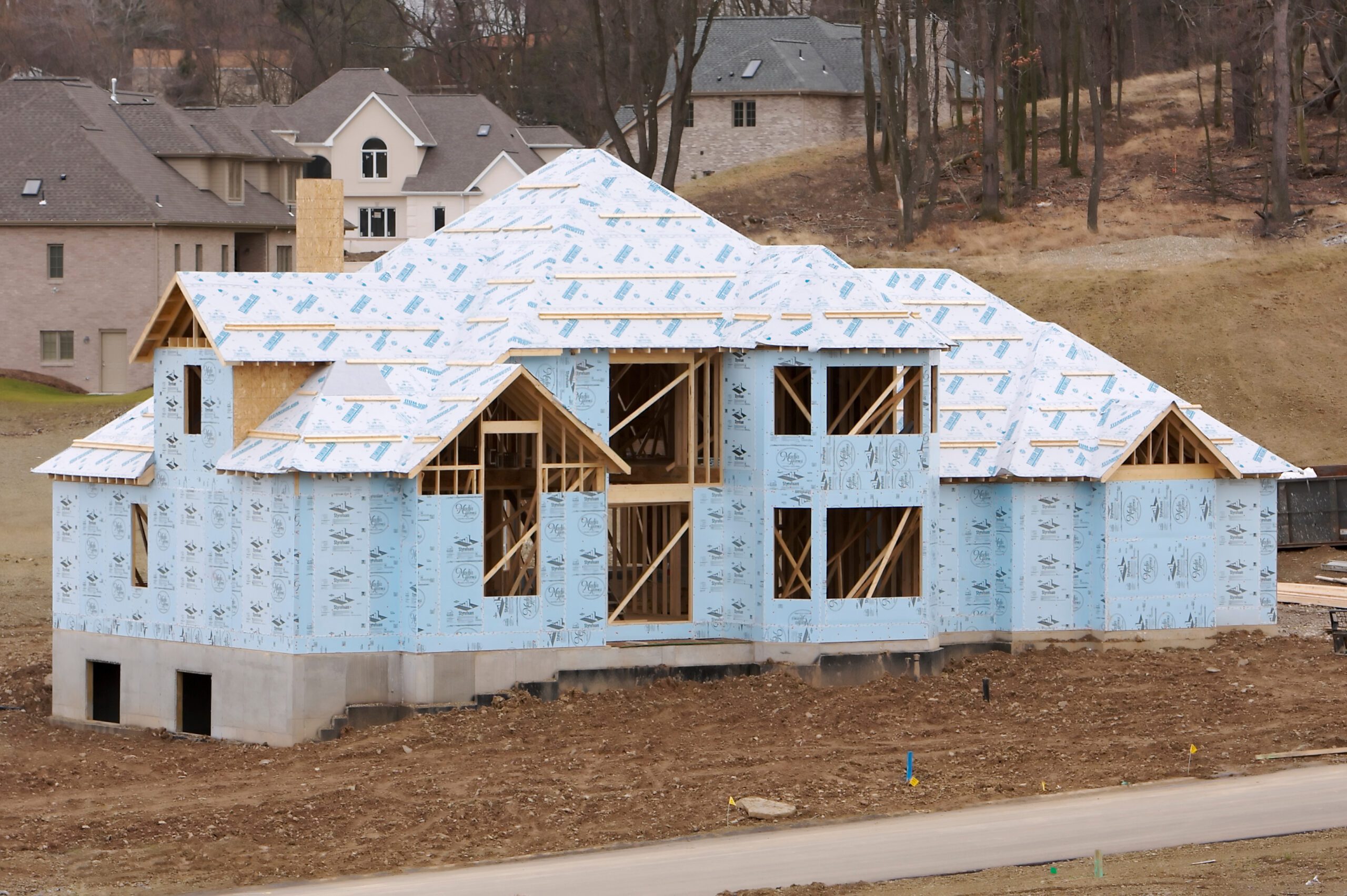 New construction single-family custom home insulation solutions