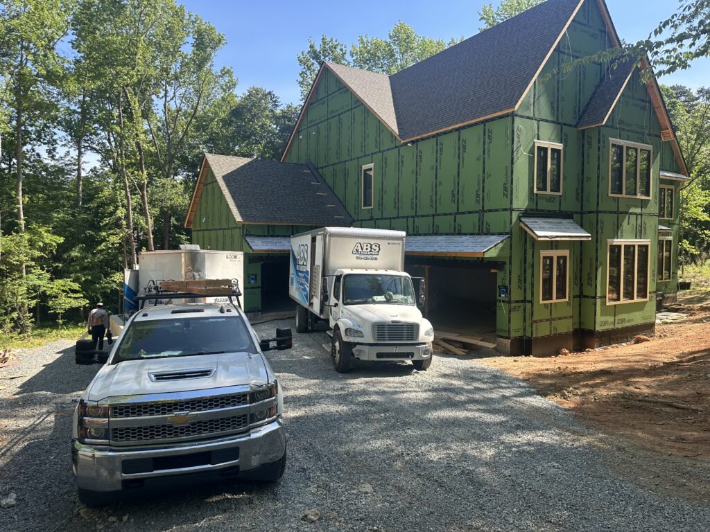 ABS Insulating trucks outside a new build